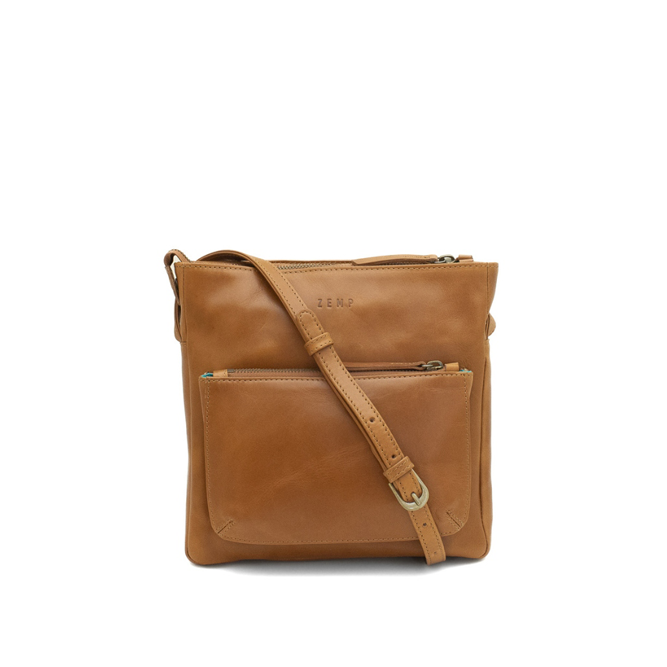 Brown leather crossbody bag on a white background