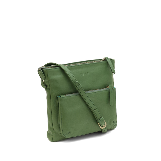 Green leather crossbody bag on a white background