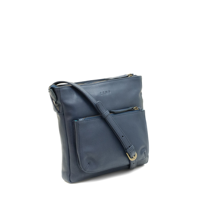 Blue leather handbag with a shoulder strap on a white background
