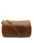 Brown leather duffel bag with a strap on a white background